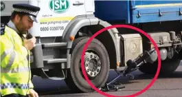  ??  ?? Crushed: Miss Gemmill’s bike, circled, under the lorry wheel