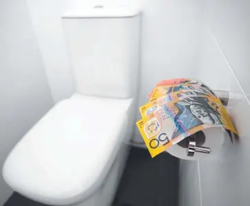  ??  ?? WIPE-OUT: Labor flushes money down the toilet. Picture: MARK PIOVESAN