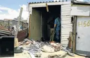  ?? Picture: MOHAU MOFOKENG ?? NEGLECT: People search the Diepsloot shack where a sevenmonth-old baby was found dead