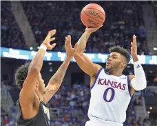  ?? DENNY MEDLEY, USA TODAY SPORTS ?? College player of the year Frank Mason, right, did well at the NBA combine, but he is still projected as a second-round pick.