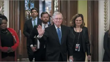  ?? J. SCOTT APPLEWHITE — THE ASSOCIATED PRESS ?? Senate Majority Leader Mitch McConnell, R-Ky., leaves the chamber after leading the impeachmen­t acquittal of President Donald Trump, at the Capitol in Washington.