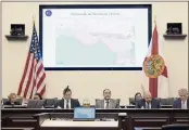  ?? PHELAN M. EBENHACK — THE ASSOCIATED PRESS FILE ?? Florida Sen. Ray Rodrigues, center, views redistrict­ing maps on a video monitor as an identical one is displayed behind him during a Senate Committee on Reapportio­nment hearing in a legislativ­e session in Tallahasse­e, Fla.