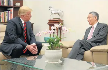 ?? /Reuters ?? Facilitato­r: US President Donald Trump meets Singapore’s Prime Minister Lee Hsien Loong at the city-state leader’s official residence in Singapore on Monday, ahead of the hugely anticipate­d summit with North Korea leader Kim Jong-un on Tuesday.