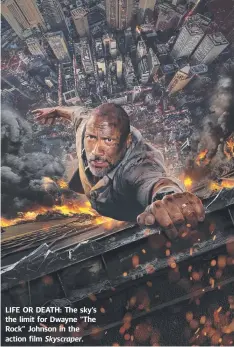 ??  ?? LIFE OR DEATH: The sky’s the limit for Dwayne “The Rock” Johnson in the action film Skyscraper.