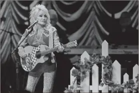  ?? Michael loccisano/Getty Images for sXsW/Tns ?? Dolly Parton performs on stage at ACL Live during Blockchain Creative Labs’ Dollyverse event at SXSW during the 2022 SXSW Conference and Festivals on March 18, in Austin, Texas.