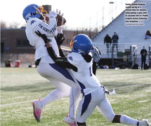  ?? ALLEN CUNNINGHAM/SUN-TIMES ?? Senior Kaliub Hopkins comes up big at a crucial time for Simeon, intercepti­ng a pass with 51 seconds left in a Public League victory Saturday over Kenwood.