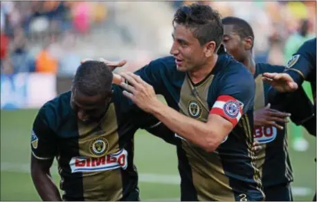  ?? MICHAEL REEVES — FOR DIGITAL FIRST MEDIA ?? Fafa Picault, left, celebrates his goal with Alejandro Bedoya. The Union made that stand up Saturday night triumph over D.C. United at Talen Energy Stadium. for a 1-0