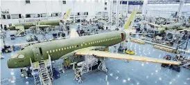  ?? [AP FILE PHOTO] ?? Bombardier’s CS100 assembly line is seen at the company’s plant in Mirabel, Quebec, Canada. The U.S. Commerce Department slapped duties of nearly 220 percent on Canada’s Bombardier C Series aircraft Tuesday.