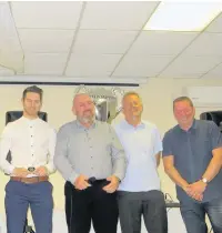  ??  ?? Callum Henry receives his reserve league Top Goal Scorer award from the club’s reserve team management Steve Jenkins, Richard Evans and Tudor Jenkins