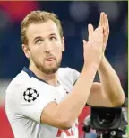  ??  ?? Tottenham Hotspur’s Harry Kane applauds the fans after beating PSV Eindhoven in London. — AFP