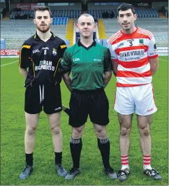  ?? (Pic: P O’Dwyer) ?? Referee Colm McDonald (Antrim) with team captains Kevin Fennelly (Fullen Gaels) and Fionn Herlihy (Ballygibli­n) prior to throw in on Sunday in Portlaoise.