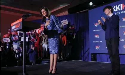  ?? Photograph: Brian Snyder/Reuters ?? Republican presidenti­al candidate Nikki Haley with her son, Nalin Haley, at her New Hampshire presidenti­al primary election night rally, in Concord, on 23 January.