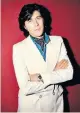  ??  ?? Suits him: Bryan Ferry wore denim with a classic blazer