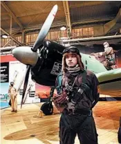  ?? JAY JONES/FOR THE CHICAGO TRIBUNE ?? In a Japanese pilot uniform, employee Kodey Gratz appears at the Pacific Aviation Museum on Ford Island, site of the first attacks by Japanese warplanes on American soil.