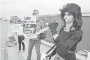  ?? Charlie Neuman / Tribune News Service ?? Nasim Aghdam takes part in an animal rights protest in 2009. Her anger at perceived YouTube censorship led her to open fire at its headquarte­rs.