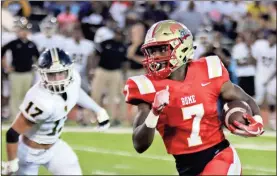  ?? / Jeremy Stewart ?? Rome High’s Xavier Roberts-Donaldson (7) carries the ball for a 20-yard gain as Carrollton’s Reid Dedman comes up behind him during Friday’s Region 7-5A game.