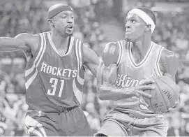  ?? Hector Amezcua / Tribune News Service ?? The Kings’ Rajon Rondo, right, tries to take Jason Terry to the basket during the Rockets’ 116-110 victory Friday night at Sleep Train Arena.