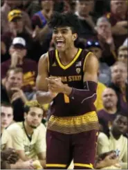  ?? RICK SCUTERI — THE ASSOCIATED PRESS ?? Arizona State guard Remy Martin (1) reacts after defeating Vanderbilt 76-64 during an NCAA college basketball game, Sunday in Tempe, Ariz.