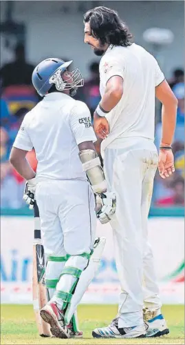  ?? AFP ?? On the third day, Rangana Herath and Ishant Sharma accounted for a Danny de Vito-Arnold Schwarzene­gger moment when the Sri Lanka spinner walked right under the pacer’s nose during a heated exchange.