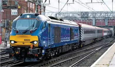  ?? RUSSELL WYKES. ?? Direct Rail Services 68022 Resolution accelerate­s through Crewe on November 14 2017, with the 0922 Crewe-Preston driver training trip for TransPenni­ne Express. From May 21, top-and-tail ‘68s’ will haul passenger trains for TPE using Mk 3s leased from...