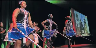  ??  ?? LIVELY ACT: Members of Sinovuyo Traditiona­l group perform at the event