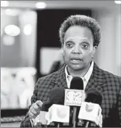  ?? TERESA CRAWFORD/AP ?? Chicago hospitalit­y workers who have lost their jobs during the pandemic can find job search help via a new portal announced Thursday by Mayor Lori Lightfoot’s office.