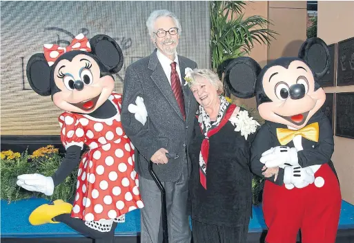  ?? STEPHEN SHUGERMAN GETTY IMAGES FILE PHOTO ?? Wayne Allwine and Russi Taylor were the voices of Mickey and Minnie Mouse, and were inseparabl­e friends. Taylor died Friday, a decade after Allwine.