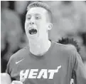  ?? LYNNE SLADKY/AP ?? Heat forward Duncan Robinson is eager to begin playing again, but only if teams can make a safe return.