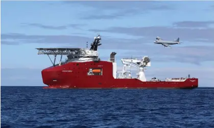  ?? Photograph: LSIS Bradley Darvill/Defence/EPA ?? The MH370 search in 2014: an RAAF Orion flying past the Australian search vessel Ocean Shield. The Australian government says it is ready to assist Malaysia if another search resumes.