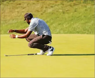  ?? Michael Reaves / Getty Images ?? Sahith Theegala reacts to a missed bogey putt on the 18th green during the final round of the Travelers Championsh­ip Sunday in Cromwell.