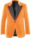  ?? Mr Porter ?? EGGSY’S orange velvet jacket is a formal but bold spy look.