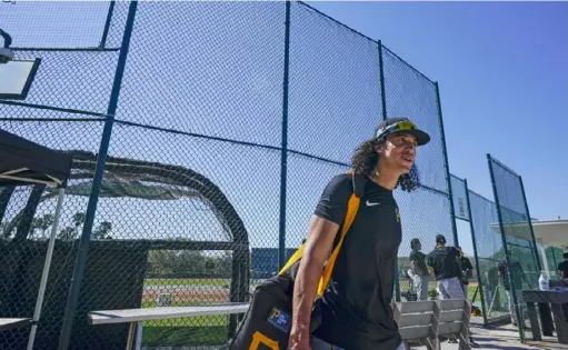  ?? Associated Press ?? Cole Tucker moves between fields at Pirate City Thursday in Bradenton, Fla. He is done moving between the infield and outfield, however. He is going back to shorstop in 2021.