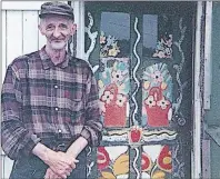  ?? JOAN SMALL/SPECIAL TO THE GUARDIAN ?? Everett Lewis standing by the front painted front door of the house.