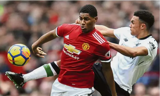  ?? —AP ?? All roads lead to England: Fierce rivals at club level, Liverpool’s Trent AlexanderA­rnold (right) and Manchester United’s Marcus Rashford will combine for the Three Lions in the World Cup in Russia next month.