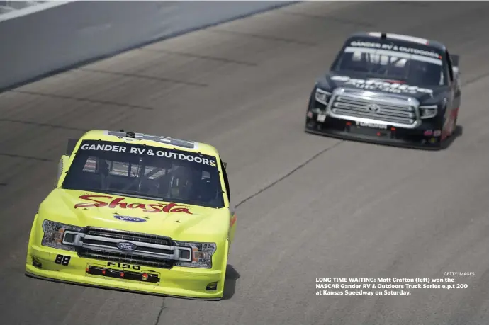  ?? Getty Images ?? LONG TIME WAITING: Matt Crafton (left) won the NASCAR Gander RV & Outdoors Truck Series e.p.t 200 at Kansas Speedway on Saturday.