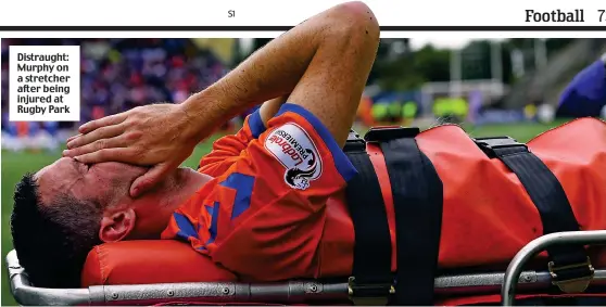  ??  ?? Distraught: Murphy on a stretcher after being injured at Rugby Park