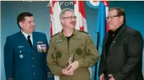  ??  ?? Major Kevin Tipper, centre, accepts Lois Boyle Award from Col. Denis O’Reilly, left, and Fellowship President Aaron Ruston, right.