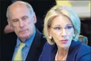  ?? Mandel Ngan AFP/Getty Images ?? BETSY DeVOS, U.S. education secretary, aims to ease regulation­s on the for-profit college industry.