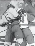  ?? By Sanford Myers, The (Nashville) Tennessean ?? Squeeze play: The Predators’ Shea Weber pushes the Red Wings’ Henrik Zetterberg into the glass.