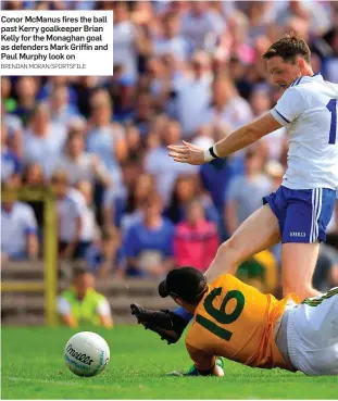  ?? BRENDAN MORAN/SPORTSFILE ?? Conor McManus fires the ball past Kerry goalkeeper Brian Kelly for the Monaghan goal as defenders Mark Griffin and Paul Murphy look on