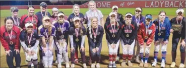  ?? PDN photo by Tom Firme ?? LeFlore County Slow-Pitch All-Tournament Team members include: First Team: Pocola’s Allyssa Parker (MVP), Lety Parga and Kylee Merritt, Howe’s Karsyn Nye and Kadynce Delt, Heavener’s Cayleigh McGee and Ava Cartwright, Panama’s Hayven Hoffman, Whitesboro’s Madison Grogan and Linley Collins and Spiro’s Kami Autrey. Second team: Pocola’s Dauslyn Brown, Heavener’s Mariana Garcia, Howe’s Maggie Wilson, LeFlore’s Miriam Luce and Erica Baldwin, Panama’s Kylee Gollihare and Gracyn Weaver, Spiro’s Desirae Reed and Ava McLemore and Talihina’s Malaree Morris.