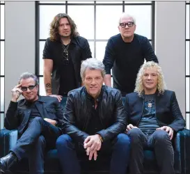  ??  ?? In this 2016 file photo, members of Bon Jovi front row from left, Tico Torres, Jon Bon Jovi, David Bryan, back row from left, Phil X, and Hugh McDonald pose for a portrait in promotion of their album “This House is Not for Sale.”