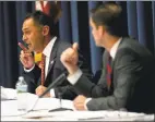  ?? Michael Cummo / Hearst Connecticu­t Media ?? Republican challenger Harry Arora, left, debates Democratic incumbent Jim Himes during the League of Women Voters 4th Congressio­nal District Debate at Wilton High School on Sunday.