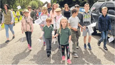  ?? Kim Cessford. Picture: ?? More than 350 gamekeeper­s, their families and traders took part in a march in Edzell yesterday to mark the upcoming grouse season.