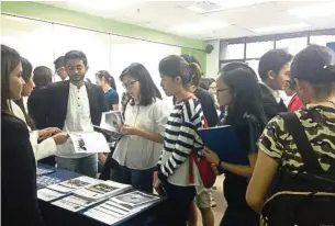  ??  ?? Attendees exploring career options at ATC’s Legal Careers Fair 2016.