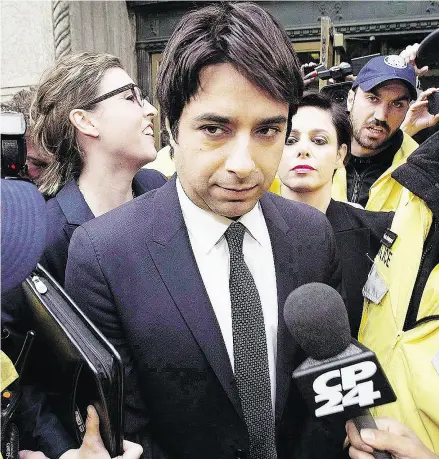  ?? DARREN CALABRESE / THE CANADIAN PRESS FILES ?? Jian Ghomeshi is escorted by police out of court in November 2014. The former CBC radio host was acquitted after incongruit­ies emerged between the complainan­ts’ allegation­s and facts in evidence.