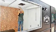  ?? [PHOTO BY JIM BECKEL, THE OKLAHOMAN] ?? D&amp;D Custom Built Food Trucks owner Deion Estrada performs electrical work inside the truck Whole Latte Pie, owned by Ben Hornbacher, who will use the truck to serve pie and coffee when completed.