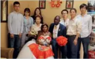  ??  ?? Chinese workers at the Kafue Gorge Lower Hydropower Station project send their blessings to a newly wedded Zambian couple on August 6, 2018