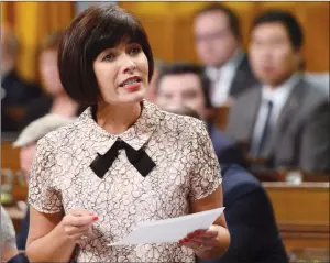  ?? CP PHOTO SEAN KILPATRICK ?? Minister of Health Ginette Petitpas Taylor stands during Question Period in the House of Commons.