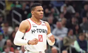  ?? Maddie Meyer / TNS ?? Russell Westbrook of the Houston Rockets reacts during a game against the Boston Celtics at TD Garden in Boston on Feb. 29. Westbrook joined the Washington Wizards at practice on Saturday, after being traded for John Wall.